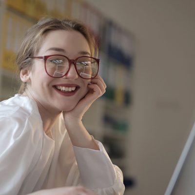 Sarah L., owner of Bright Clean Co., in uniform